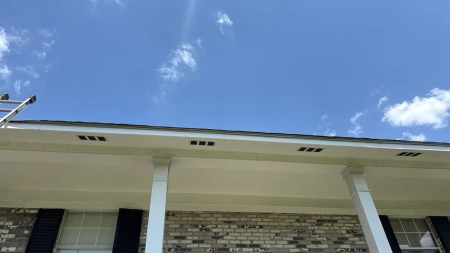 Soffit vents along a home's roofline, part of the attic ventilation system