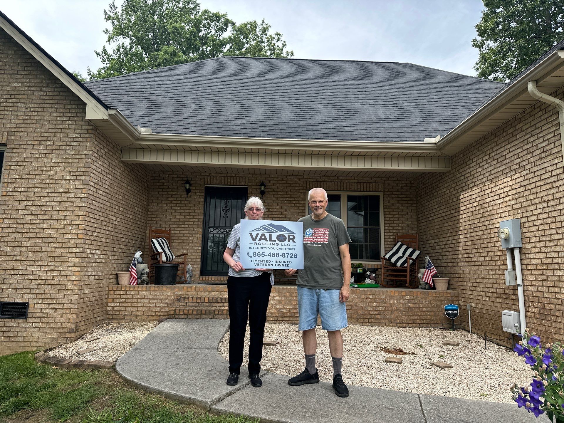 Local roofing crew working on a Knoxville home after a storm